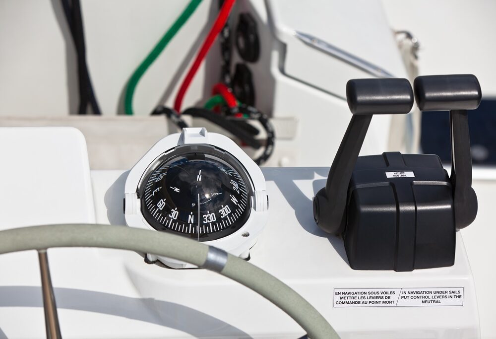 Sailing yacht control wheel and implement. Horizontal shot without people